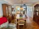 Another angle of the traditional dining room shows hardwood floors and a partial view of the adjacent kitchen at 5980 Shore S Blvd # 510, Gulfport, FL 33707