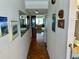 Hallway showing a glimpse into the living room with its large window and water view at 5980 Shore S Blvd # 510, Gulfport, FL 33707