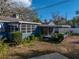 The backyard features a sunroom and a screened in porch at 1213 60Th S St, Gulfport, FL 33707