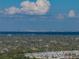 Picturesque skyline view from a distance with a clear blue sky and lush greenery in the foreground at 1213 60Th S St, Gulfport, FL 33707