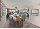 Charming dining area with views of the kitchen, backyard, and neighborhood at 1213 60Th S St, Gulfport, FL 33707