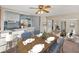 Open concept dining area with seating for six and views into the kitchen and living room at 1213 60Th S St, Gulfport, FL 33707
