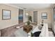 Bright living area with a white sofa and connecting rooms at 1213 60Th S St, Gulfport, FL 33707