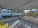 Screened-in patio with tiled flooring overlooking the backyard at 1213 60Th S St, Gulfport, FL 33707