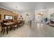 Formal dining room has tile floors, traditional furniture and a view of the front entrance at 109 Live Oak Ln, Largo, FL 33770