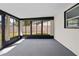 Enclosed patio with ample sunlight at 1520 Arnold Ave, Brooksville, FL 34601