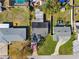 Aerial view of a residential neighborhood showcasing well-maintained homes, mature trees, and green lawns at 2713 W Osborne Ave, Tampa, FL 33614
