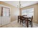 Cozy dining area with chandelier and natural light, perfect for Gathering meals at 2713 W Osborne Ave, Tampa, FL 33614