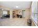 Open living space with tile floors and seamless transition to living room at 2713 W Osborne Ave, Tampa, FL 33614