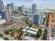 Panoramic aerial view of a coastal city featuring modern high-rise buildings, waterfront views, and vibrant green spaces at 337 4Th S Ave, St Petersburg, FL 33701