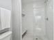 Contemporary bathroom with a spacious glass shower featuring marble-patterned tile and a built-in bench at 337 4Th S Ave, St Petersburg, FL 33701