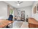 Bright home office with a large desk, comfortable seating, and ample natural light at 337 4Th S Ave, St Petersburg, FL 33701