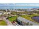 Beautiful aerial view of a condo community near a serene lake and the ocean at 4744 Snook Se Dr, St Petersburg, FL 33705