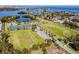 Expansive aerial view of community with tennis courts and sports fields, showcasing the recreational amenities at 4744 Snook Se Dr, St Petersburg, FL 33705