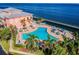 Overhead shot showcases a community pool and nearby dock for residents to enjoy at 4744 Snook Se Dr, St Petersburg, FL 33705