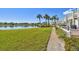 Well-manicured lawn with a lake view at 4744 Snook Se Dr, St Petersburg, FL 33705