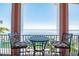 Enjoy stunning water views from this cozy balcony with seating for two at 4744 Snook Se Dr, St Petersburg, FL 33705