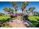 Clubhouse view showcasing the manicured landscaping, attractive fountains and a welcoming entrance at 4744 Snook Se Dr, St Petersburg, FL 33705