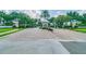 Inviting community entrance with meticulous landscaping and controlled access at 4744 Snook Se Dr, St Petersburg, FL 33705