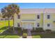 Charming condo exterior with manicured landscaping and a welcoming entrance at 4744 Snook Se Dr, St Petersburg, FL 33705