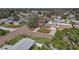 Overhead shot of a house with mature trees in a quiet residential area at 5559 17Th N Ave, St Petersburg, FL 33710