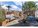 Relaxing outdoor patio area with comfortable seating and a cozy fire pit at 5559 17Th N Ave, St Petersburg, FL 33710