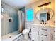 Beautiful bathroom featuring a walk-in shower, blue tile, vanity, and modern fixtures at 620 43Rd Street W Blvd, Palmetto, FL 34221