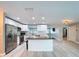 Modern kitchen with stainless steel appliances, a butcher block island, and white shaker cabinets at 620 43Rd Street W Blvd, Palmetto, FL 34221