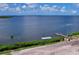Beautiful waterfront view with a private dock and boat lift, perfect for boating and enjoying the water at 620 43Rd Street W Blvd, Palmetto, FL 34221