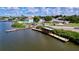 Scenic waterfront view showcasing a private dock with boat access in a tranquil setting at 620 43Rd Street W Blvd, Palmetto, FL 34221