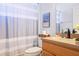 Cozy bathroom with a shower and tub combination featuring modern fixtures and tasteful decor at 8315 Moccasin Trail Dr, Riverview, FL 33578