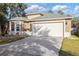 A daytime exterior shot of the house at 8315 Moccasin Trail Dr, Riverview, FL 33578