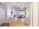 Spacious living room featuring tile floors, high ceilings, and large windows for plenty of natural light at 8315 Moccasin Trail Dr, Riverview, FL 33578
