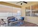 Relaxing screened patio with comfortable seating, perfect for enjoying the outdoors at 8315 Moccasin Trail Dr, Riverview, FL 33578