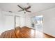 Bedroom with wood floors, two closets and sliding doors to outdoor deck at 8922 Donna Lu Dr, Odessa, FL 33556