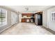Large kitchen with stainless steel appliances, tile floors and lots of cabinet space at 8922 Donna Lu Dr, Odessa, FL 33556