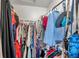 Walk-in closet with clothing racks and plentiful storage in the bedroom at 1204 50Th E St, Bradenton, FL 34208