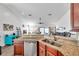 Kitchen features granite countertops and stainless steel appliances at 1204 50Th E St, Bradenton, FL 34208
