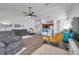 Open floor plan showcases the living room, kitchen, and breakfast bar with seating at 1204 50Th E St, Bradenton, FL 34208