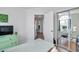 Home office featuring a large window, white walls, and view into adjacent space at 1204 50Th E St, Bradenton, FL 34208