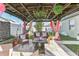 Backyard featuring cozy outdoor living area with pergola and backyard seating at 13218 Satin Lily Dr, Riverview, FL 33579