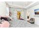 Stylized primary bedroom featuring a walk-in closet and a seating area at 13218 Satin Lily Dr, Riverview, FL 33579