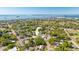 Breathtaking aerial showcases the property's proximity to the beach, blending a residential neighborhood with serene waterfront views at 2016 Culberson Ave, Dunedin, FL 34698