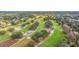 Lush green golf course with well manicured greens and mature trees, offering a picturesque landscape at 2016 Culberson Ave, Dunedin, FL 34698