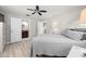 Spacious main bedroom featuring connecting bathroom and an additional room for closet space at 2016 Culberson Ave, Dunedin, FL 34698