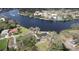 An aerial view shows the home near the water and the surrounding neighborhood at 2102 W Ivy St, Tampa, FL 33607