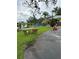 This beautifully landscaped backyard by the water offers a serene retreat at 2102 W Ivy St, Tampa, FL 33607