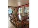 Formal dining room with a large table, wood floors, and view of the water at 2102 W Ivy St, Tampa, FL 33607
