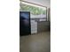 Compact kitchenette area showing essential appliances at 2102 W Ivy St, Tampa, FL 33607