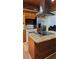 Well-equipped kitchen with stainless steel appliances and center island at 2102 W Ivy St, Tampa, FL 33607